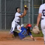 Klein Cain sophomore third baseman Emily Tran, center, finishes a play against Houston Christian baserunner Katie Hartwell (18) during the top of the third inning of their non-district matchup at KCHS on March 26, 2019.